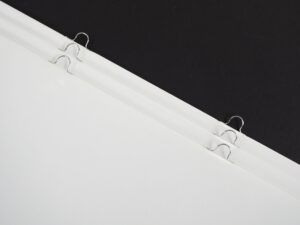 Impresión de catálogos personalizables encuadernación grapa omega