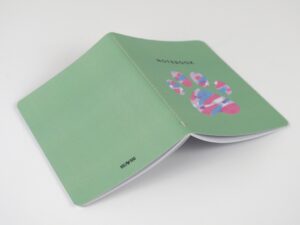 Impresión personalizable de libretas con cosido singer