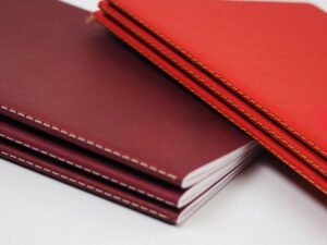 Imprimir catálogos encuadernación cosido visto personalizados