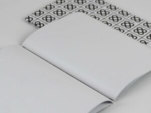 Impresión personalizada de libreta con encuadernación artesanal cosido singer